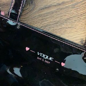 Vogue vinyl latex black and pink playboy esque bag